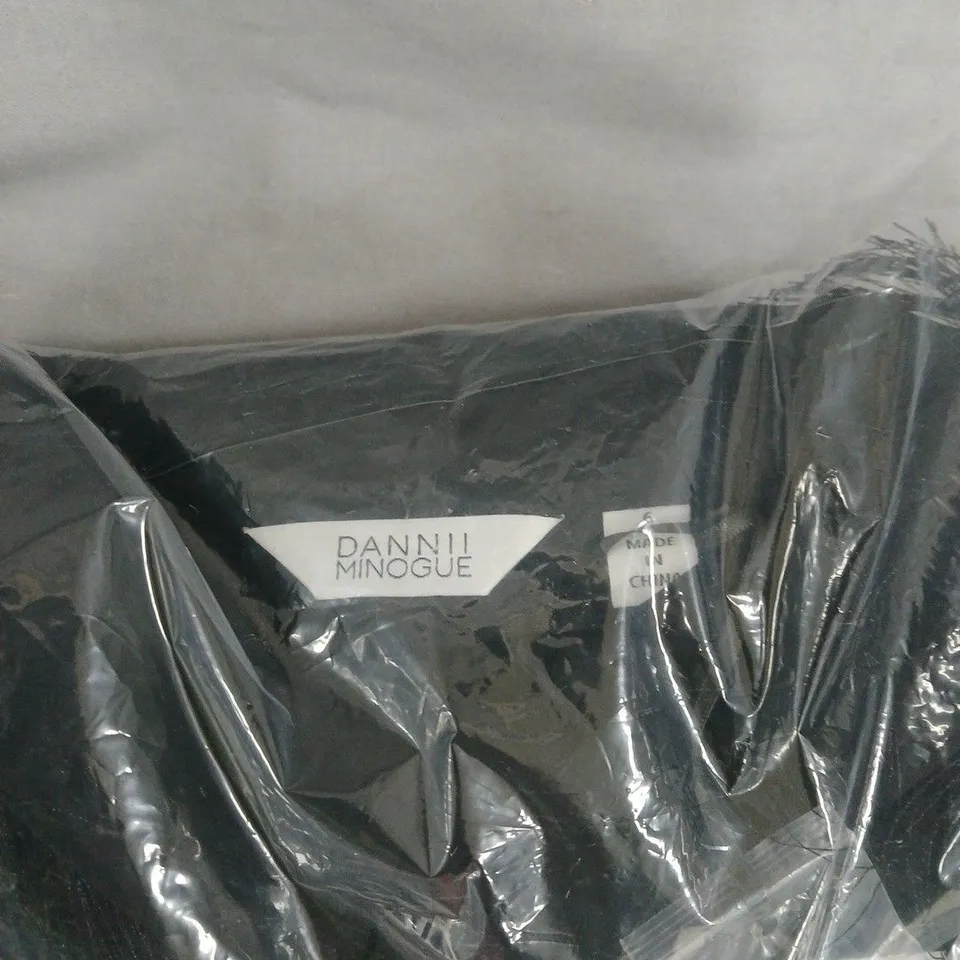 DANNI MINOGUE BLACK GARMENT SIZE 6. BAGGED