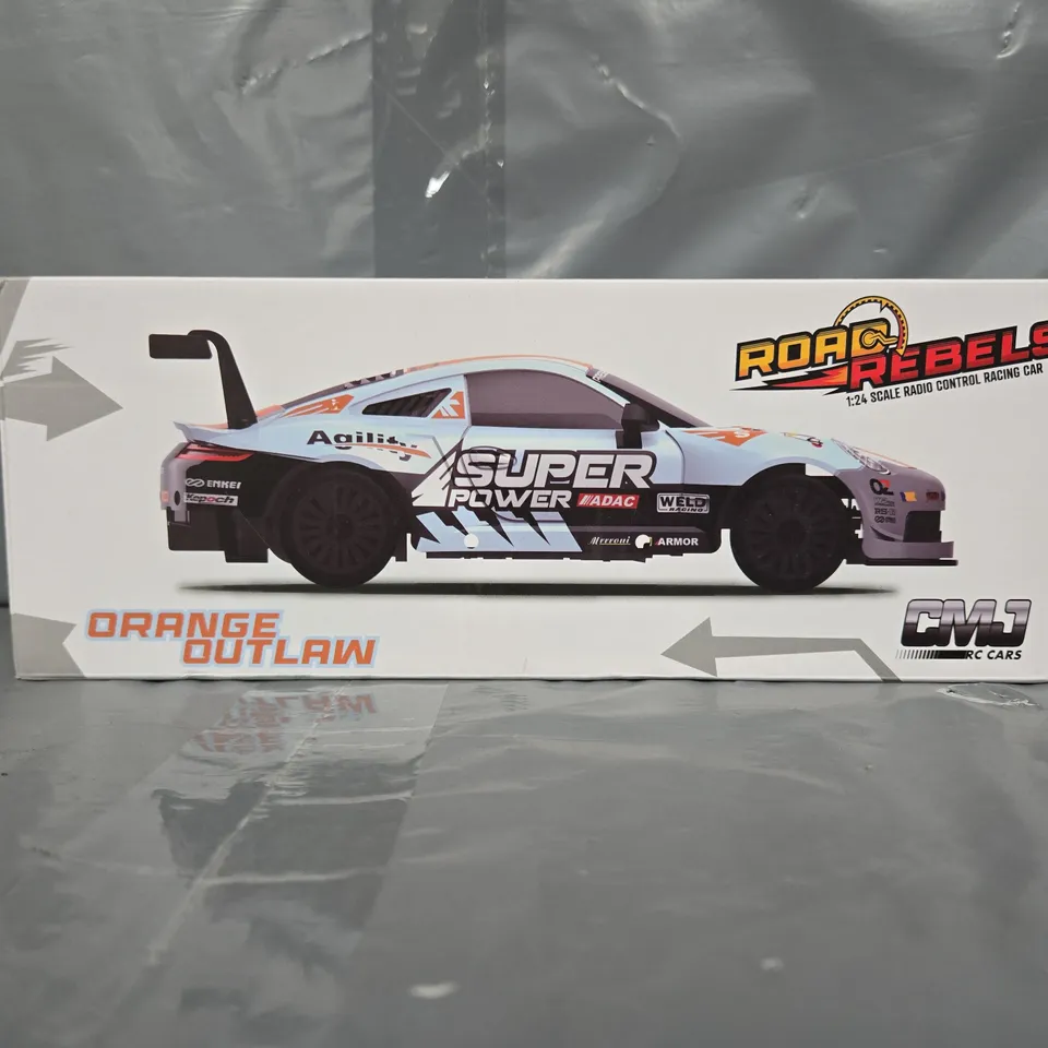 BOXED ROAD REBELS ORANGE OUTLAW RC CAR