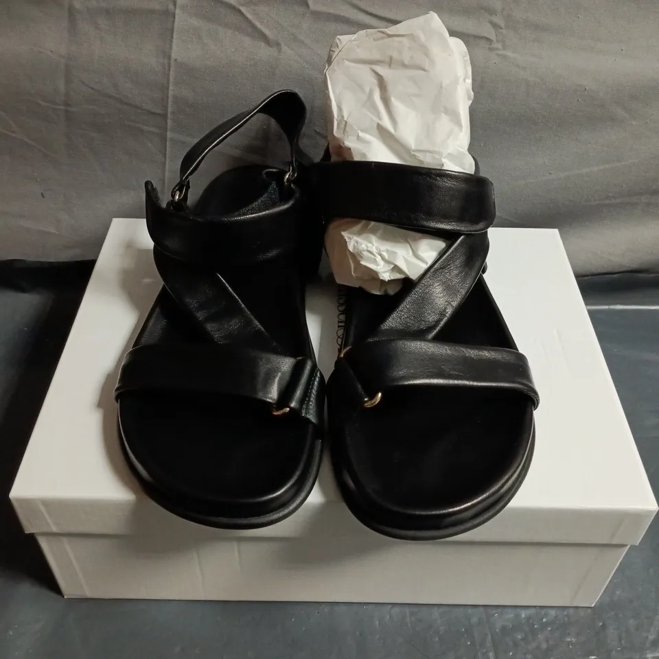 BOXED PAIR OF RUSSELL AND BROMLEY BLACK LEATHER SANDALS - SIZE 40