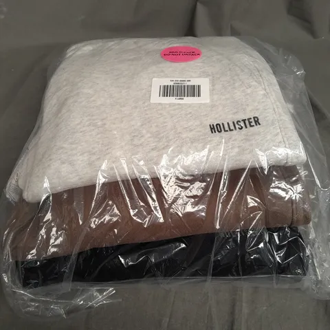 SEALED HOLLISTER SET OF 3 JOGGERS IN VARIOUS COLOURS TO INCLUDE - GREY , BROWN , BLACK - XL