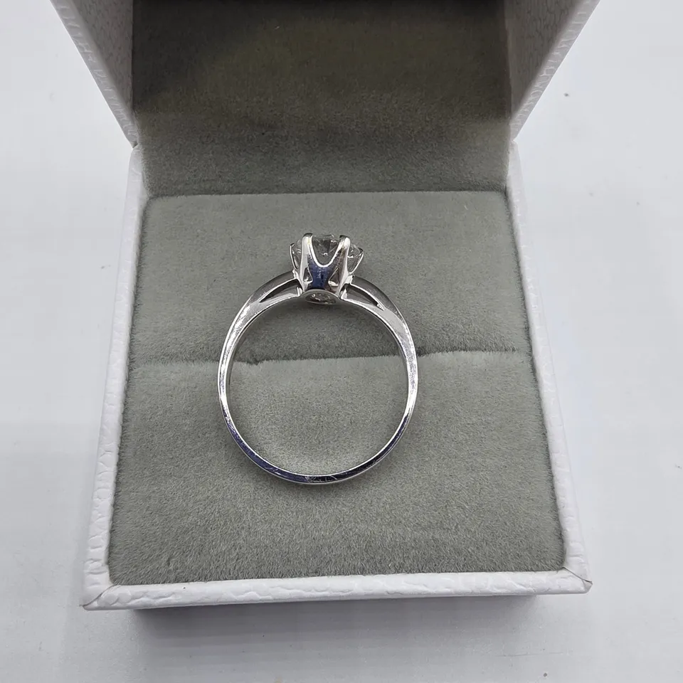 18CT WHITE GOLD SOLITAIRE RING SET WITH A NATURAL DIAMOND WEIGHING +-1.23CT