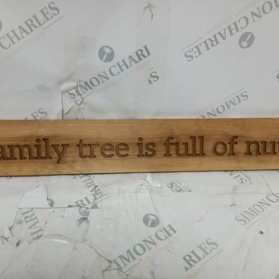 WOODEN SIGN- OUR FAMILY TREE IS FULL OF NUTS 