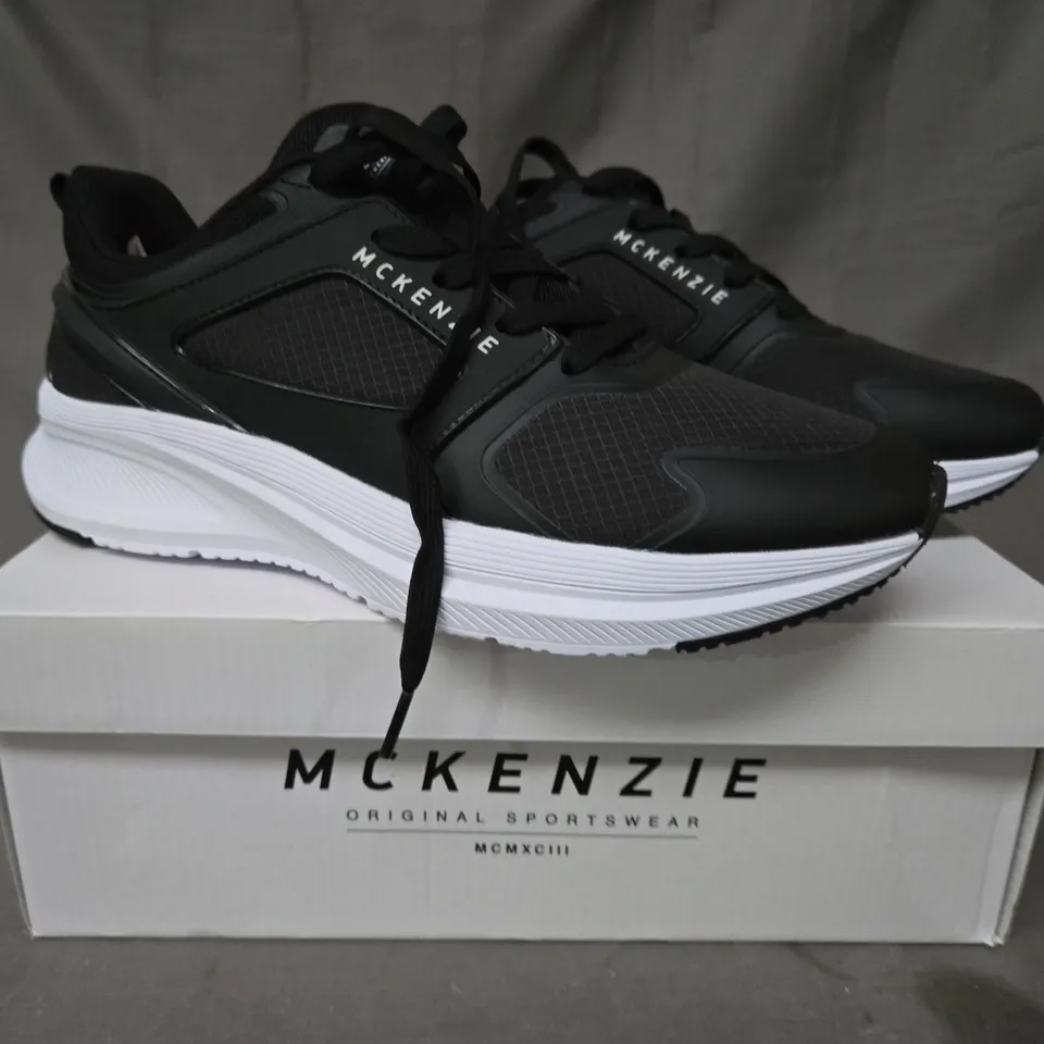 BOXED PAIR OF MCKENZIE SHOES IN BLACK/WHITE UK SIZE 9