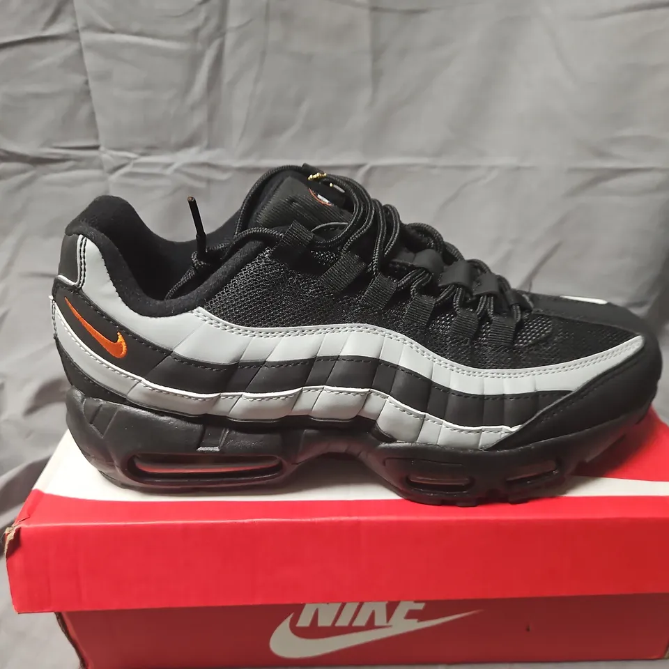 BOXED NIKE AIR MAX 95 TT TRAINERS – UK 7 – BLACK/GRAY/WHITE WITH ORANGE SWOOSH