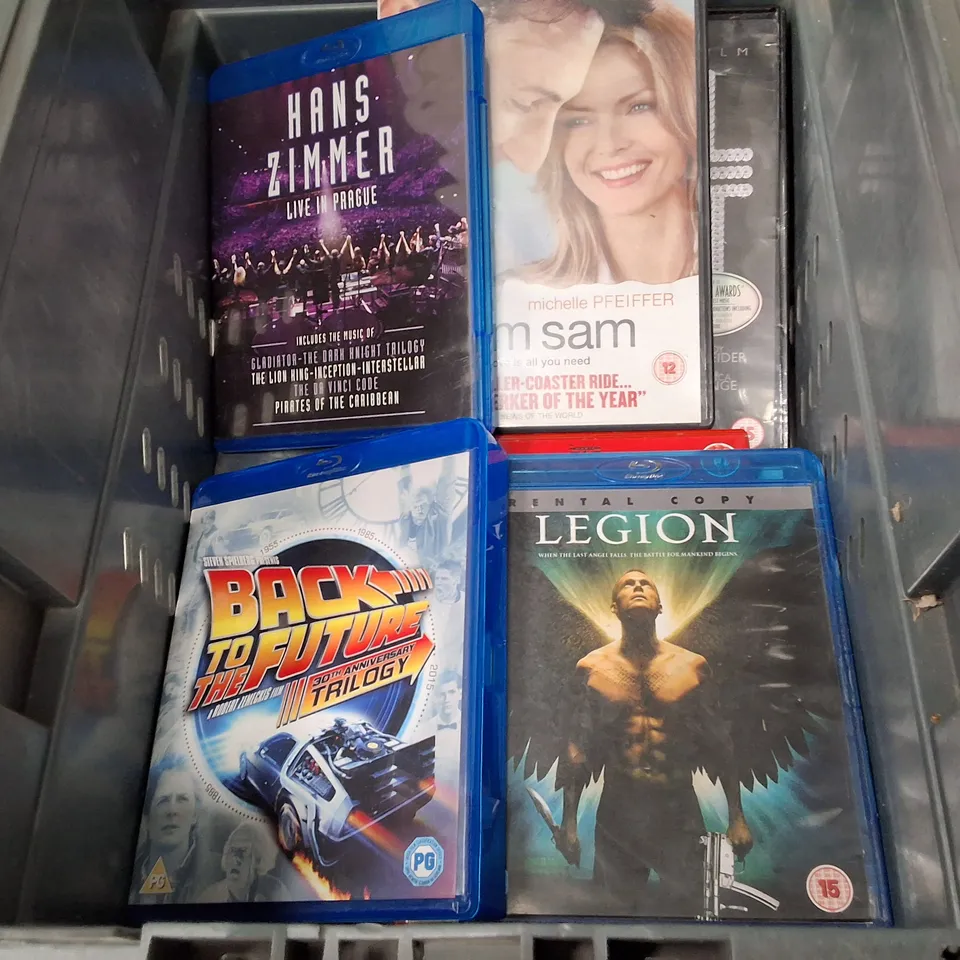 TOTE CONTAINING ASSORTED DVDS INCLUDING LEGION BLU-RAY, BACK TO THE FUTURE 30TH ANNIVERSARY TRILOGY BLU-RAY, I AM SAM DVD & HANS ZIMMER LIVE IN PRAGUE BLU-RAY