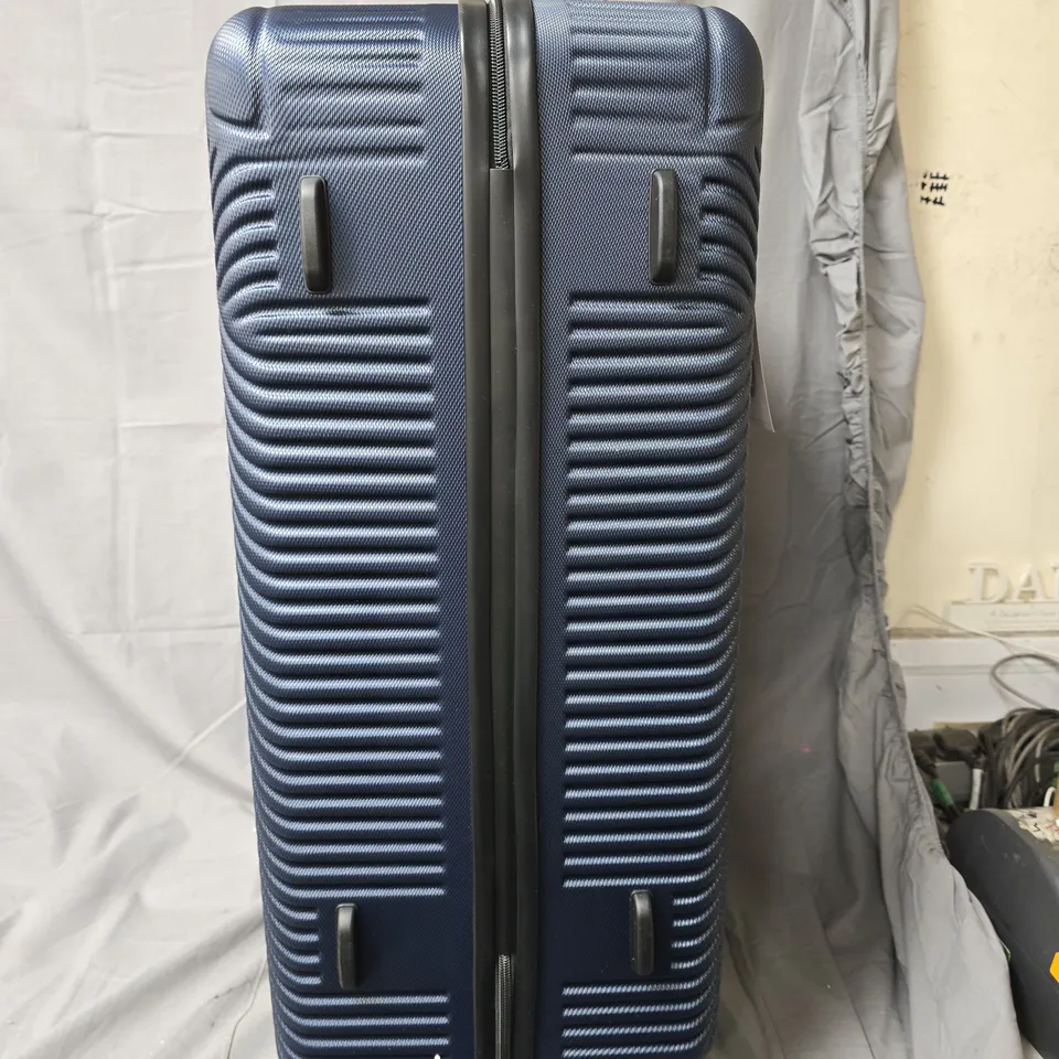 BLOOMLITE BLUE HARD-SHELL SUITCASE WITH 4 WHEELS - DIAGONAL RIBBED TEXTURE (136L)