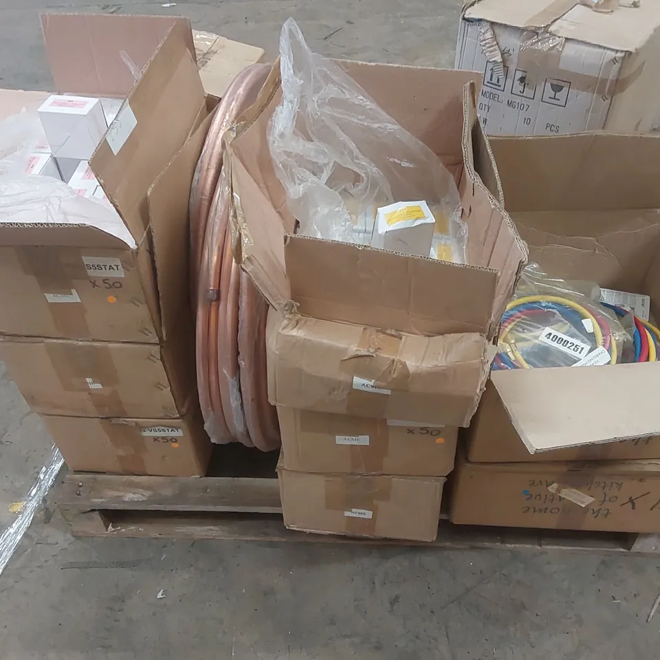 PALLET CONTAINING A LARGE QUANTITY OF ASSORTED CATERING EQUIPMENT SPARES INCLUDING: COPPER PIPE, REPLACEMENT THERMOSTATS FOR FRIDGES AND FREEZERS, CHARGING HOSES ECT