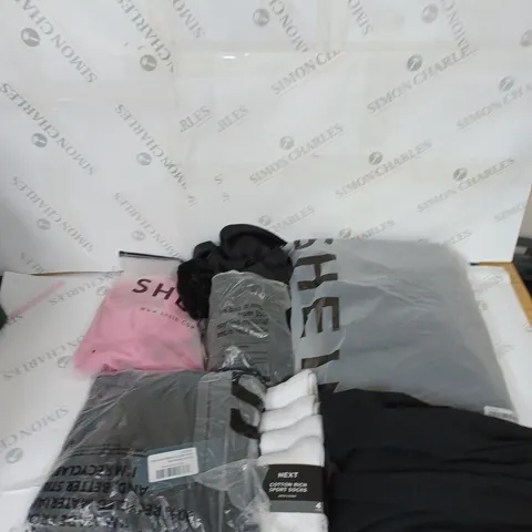 LARGE BOX OF ASSORTED CLOTHING ITEMS IN VARIOUS COLOURS AND SIZES INCLUDING TROUSERS , TOPS AND JUMPERS