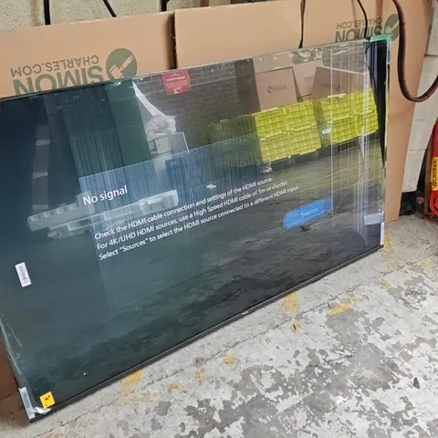 BOXED PHILIPS 65"AMBILIGHT SERIE 8500 TV WITH REMOTE - POWERS ON - DAMAGED SCREEN 