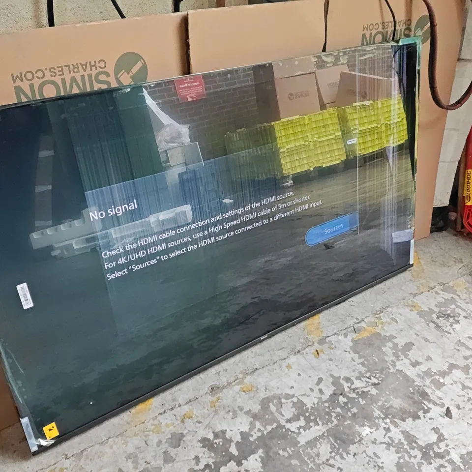 BOXED PHILIPS 65"AMBILIGHT SERIE 8500 TV WITH REMOTE - POWERS ON - DAMAGED SCREEN 