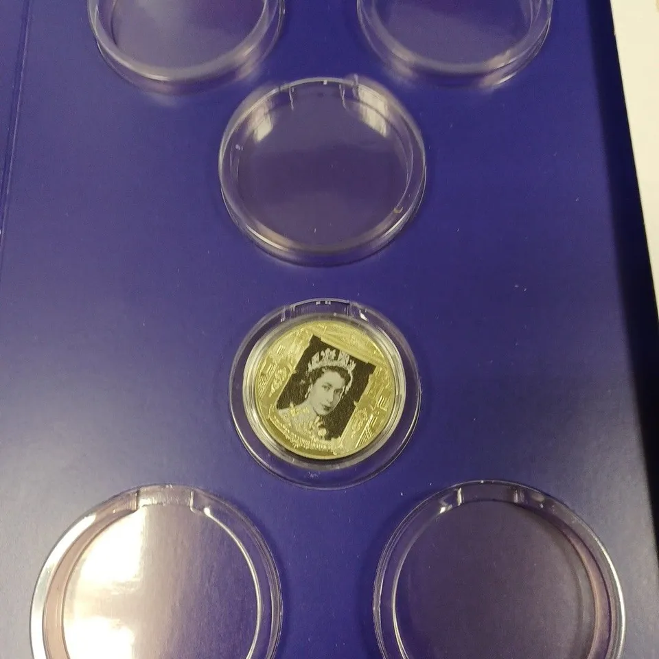 BOX TO CONTAIN APPROX. 7 X COLLECTABLE COIN FOLDERS. ONE COIN IN EACH COLLECTING FOLDER.