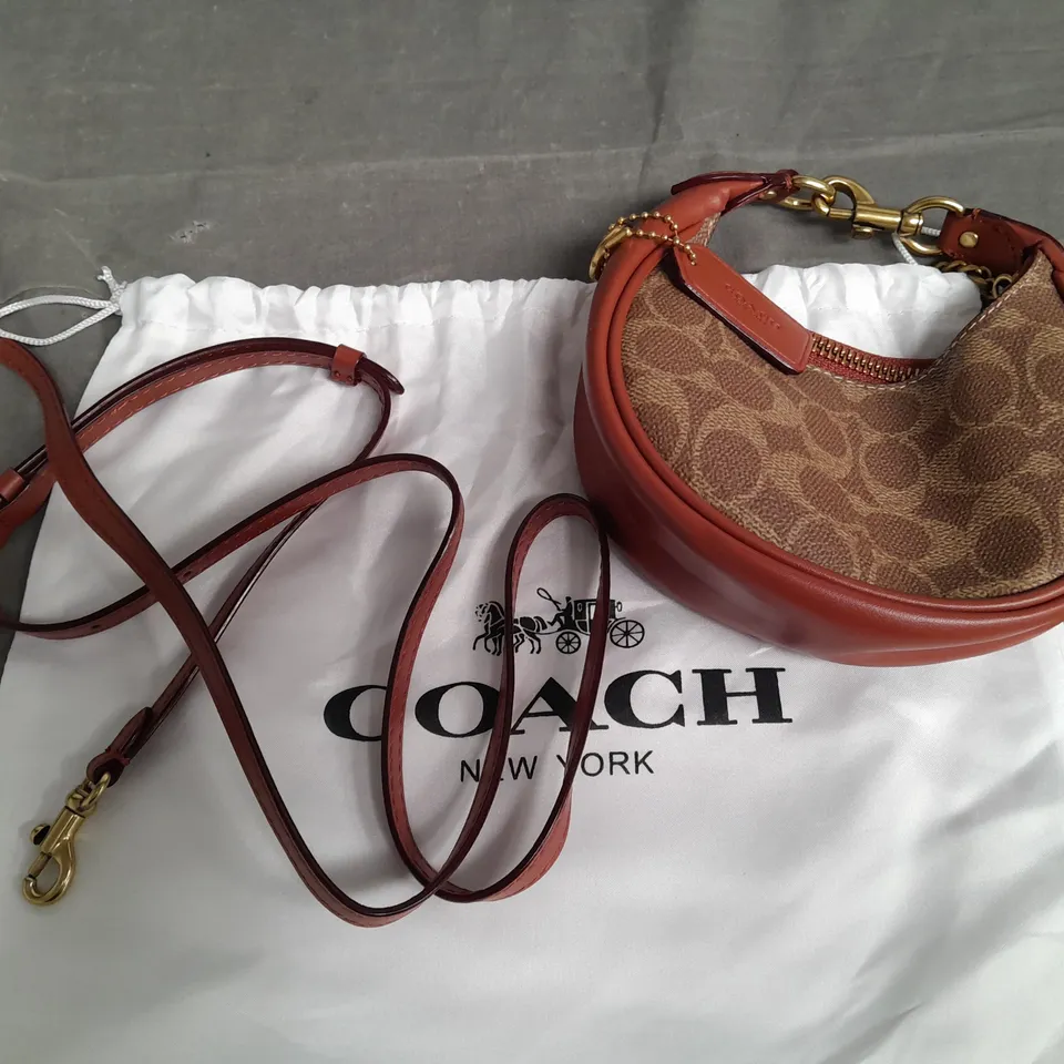 COACH ROUND MINI BAG IN BROWN
