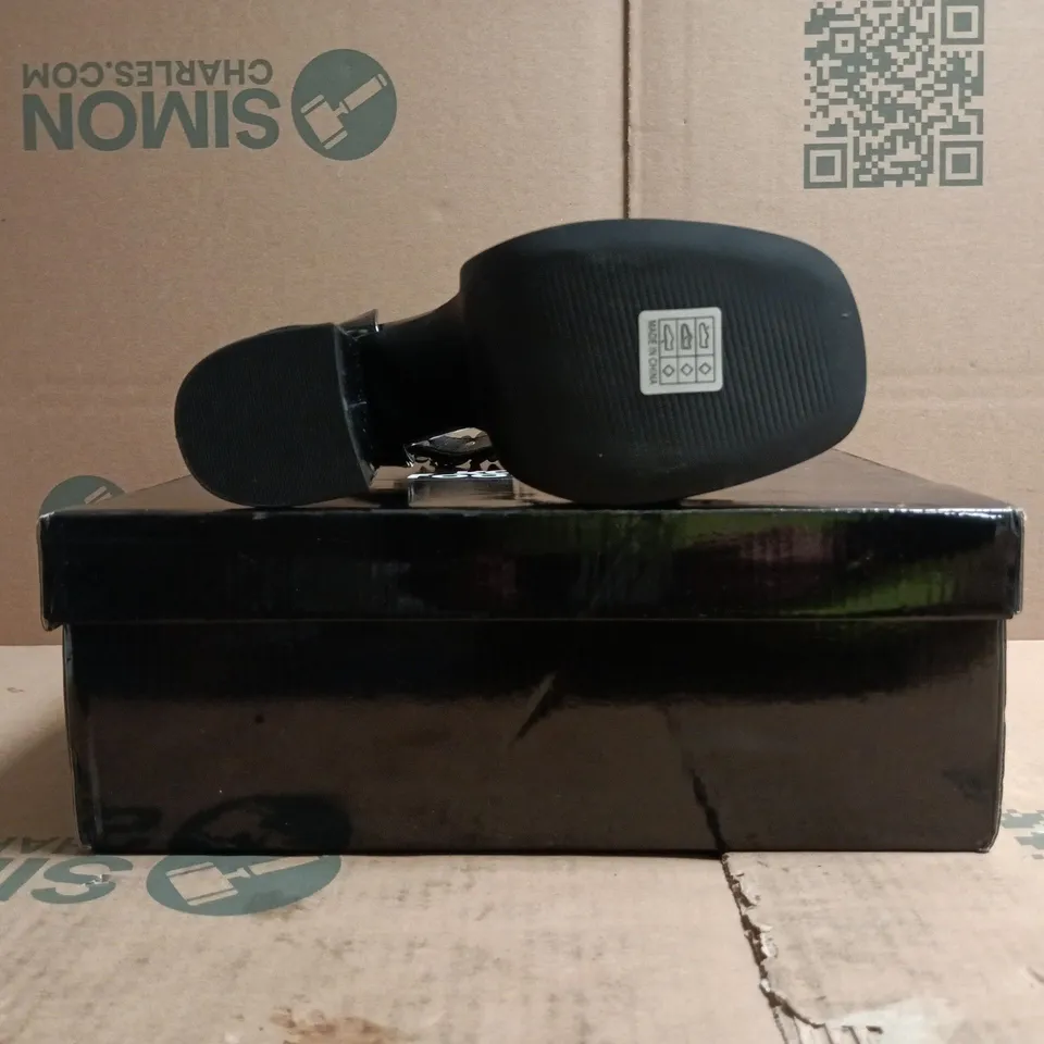 BOXED PAIR OF KOI PLATFORM HEELS IN BLACK SIZE 4