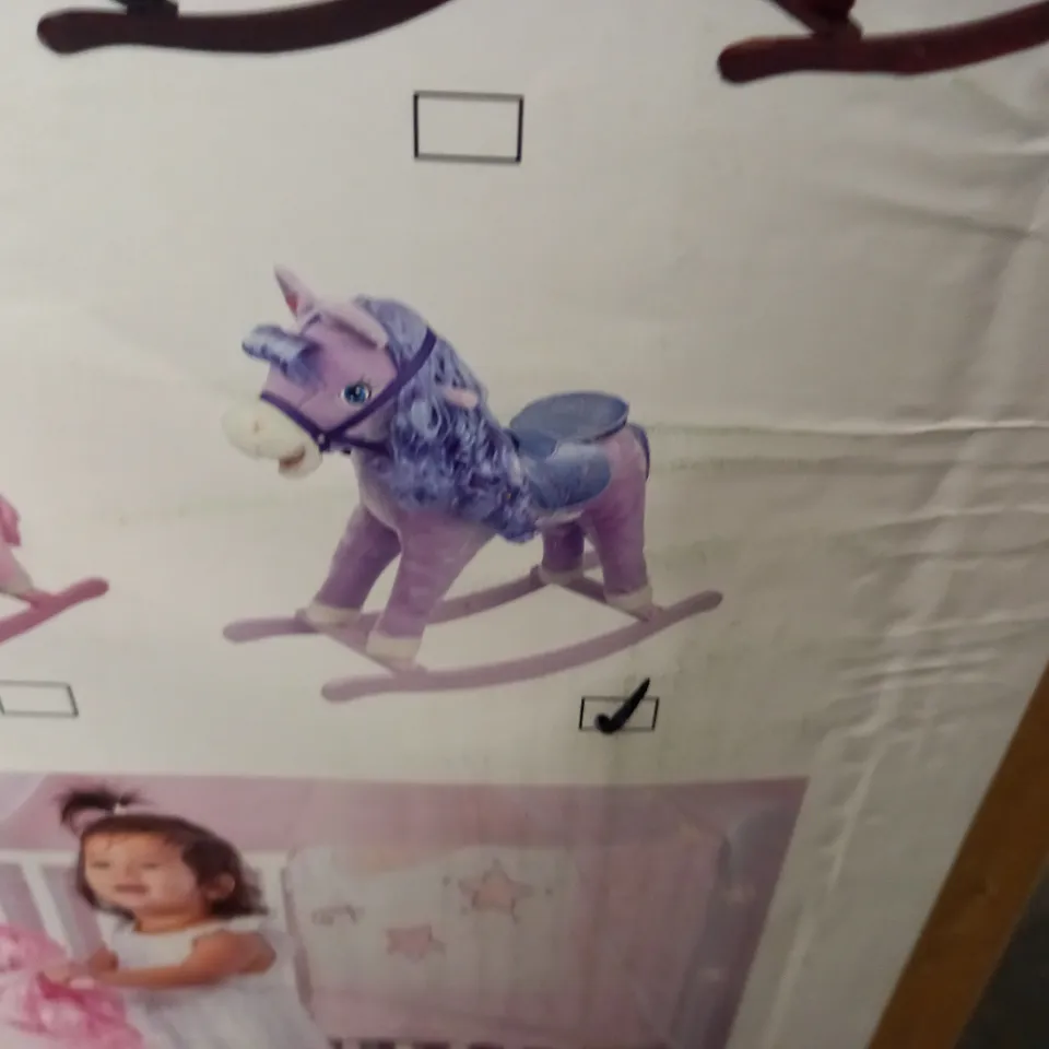 BOXED PURPLE ROCKING HORSE