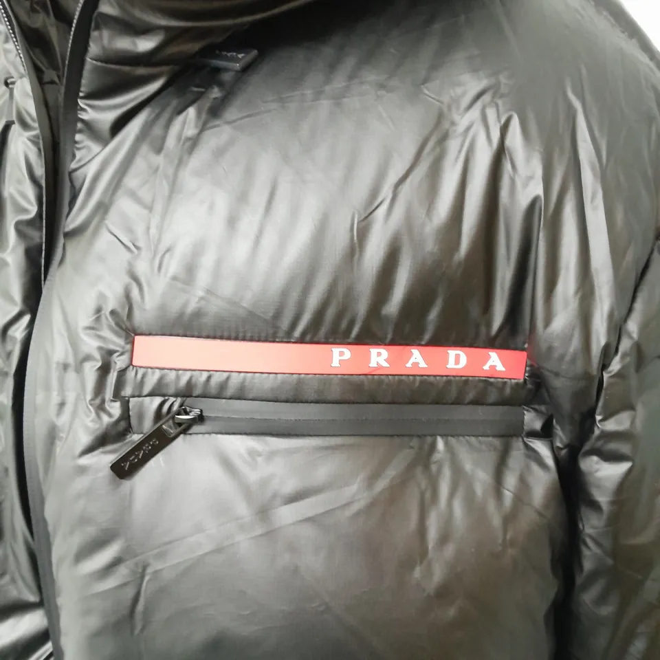 PRADA HEAVY PADDED PUFFER JACKET WITH HOOD IN BLACK - XL
