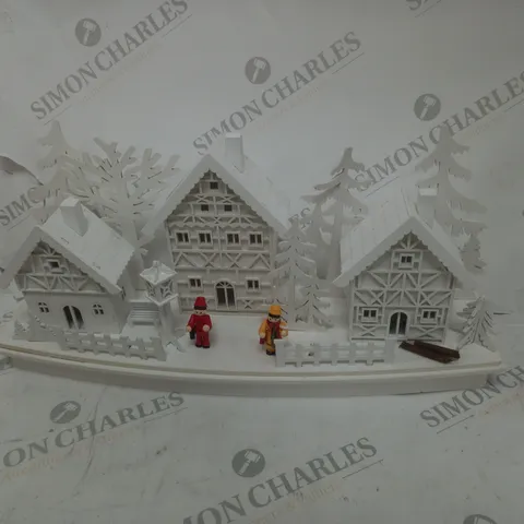 WHITE WOOD LIT VILLAGE SCENE