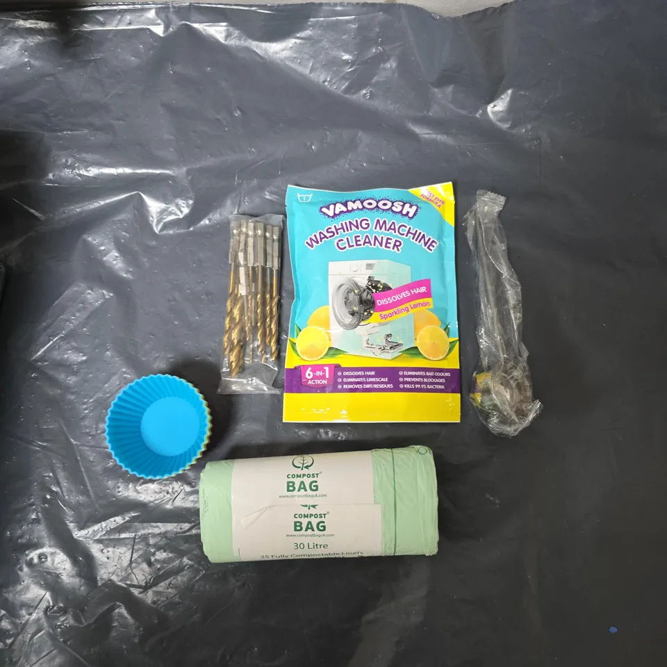 APPROXIMATELY 15 ASSORTED HOUSEHOLD ITEMS TO INCLUDE WASHING MACHINE CLEANER, BIN LINERS, DRILL BITS, CUPCAKE MOULDS & MEASURING SPOON