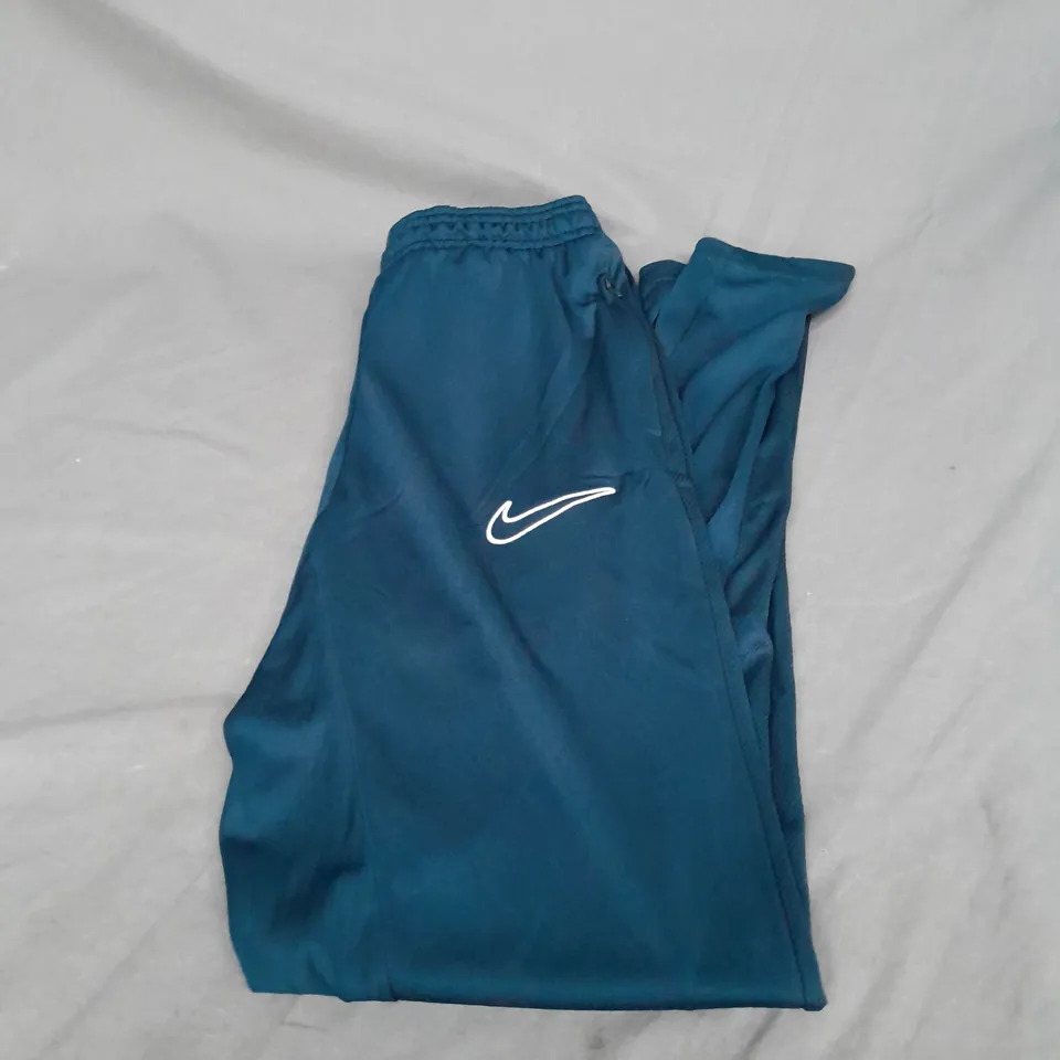 NIKE DRI-FIT TRACK PANTS IN DARK TEAL SIZE S