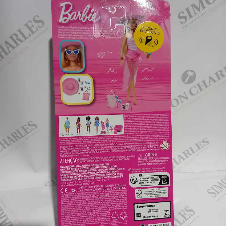 BLONDE BARBIE DOLL WITH SWIMSUIT AND BEACH-THEMED ACCESSORIES