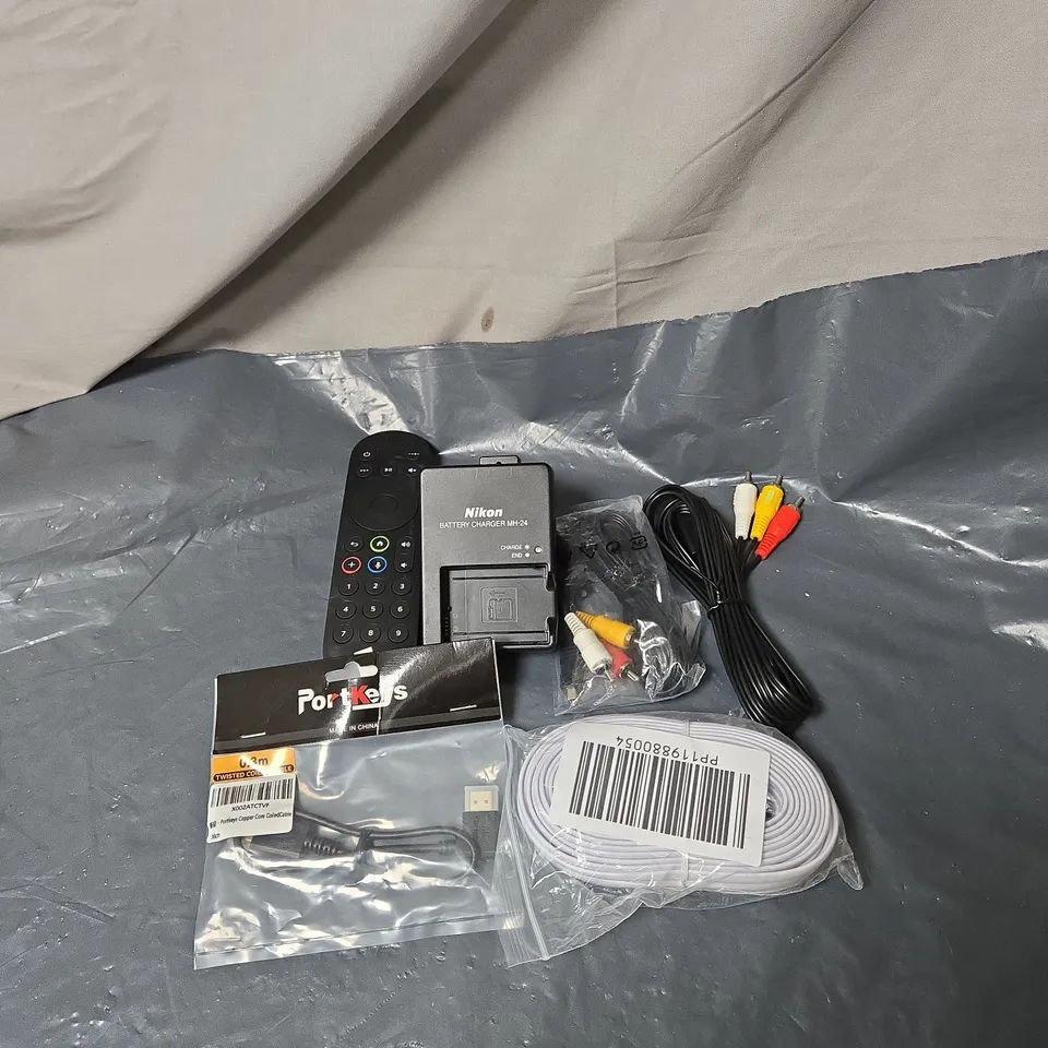 APPROXIMATELY 12 ASSORTED ITEMS TO INCLUDE SKY REMOTE CONTROL, CABLES, NIKON CHARGER ETC