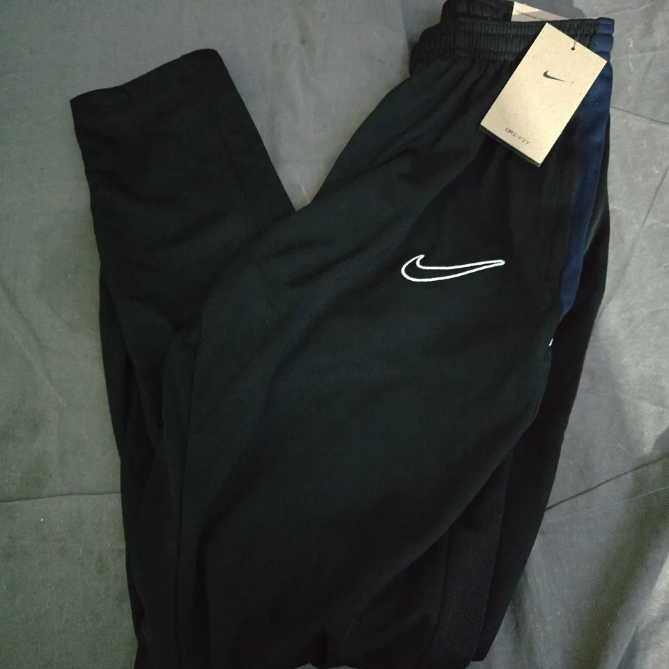 NIKE ACADEMY TRACKSUIT BOTTOMS IN BLACK - MEDIUM