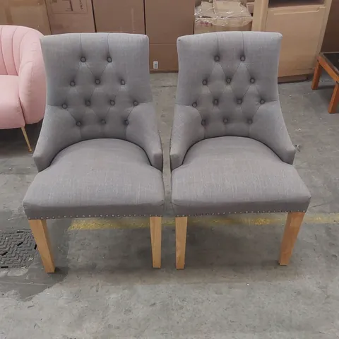 PAIR OF DESIGNER BUTTON TUFTED FABRIC UPHOLSTERED DINING CHAIRS