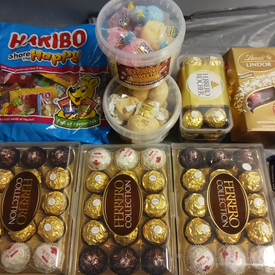 LOT OF ASSORTED FOOD ITEMS TO INCLUDE FERRERO ROCHER, LINDT AND ASSORTED BARS