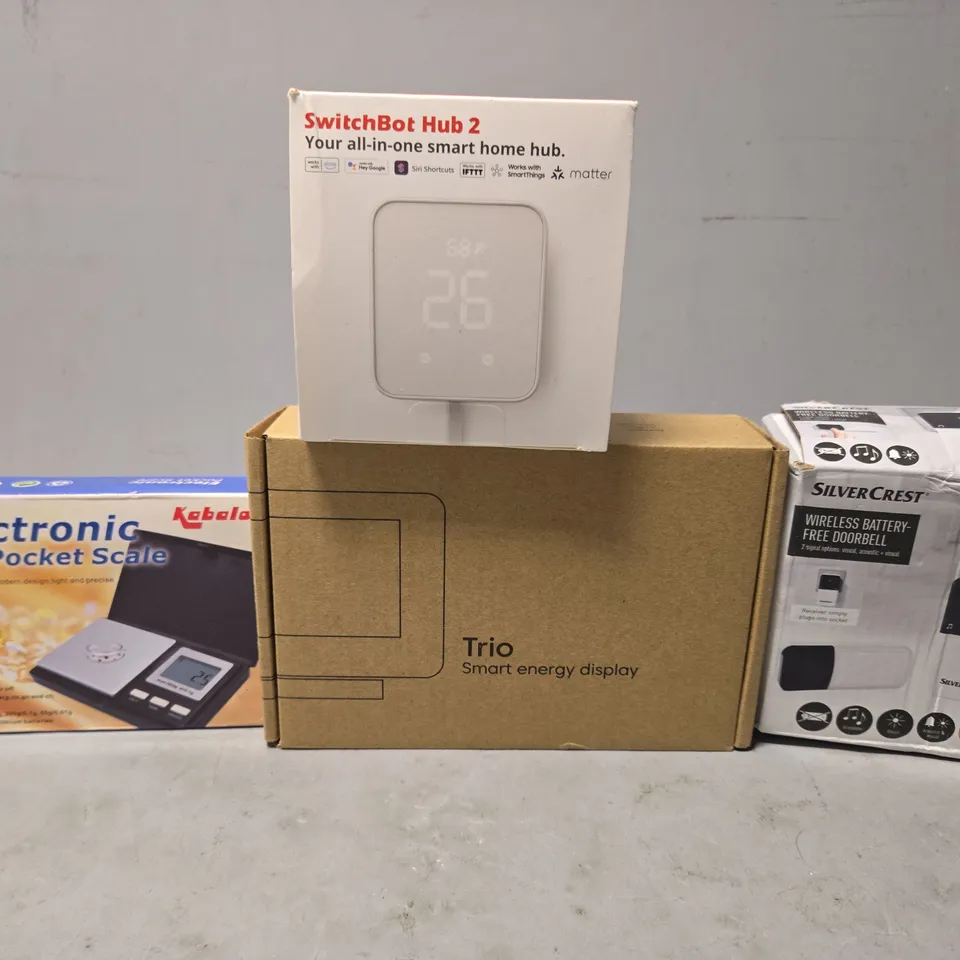 TOTE OF APPROXIMATELY 7 ASSORTED ITEMS TO INCLUDE -SWITCHBOT HUB 2  , SILVERCREST DOORBELL , TRIO SMART ENERGY DISPLAY ETC