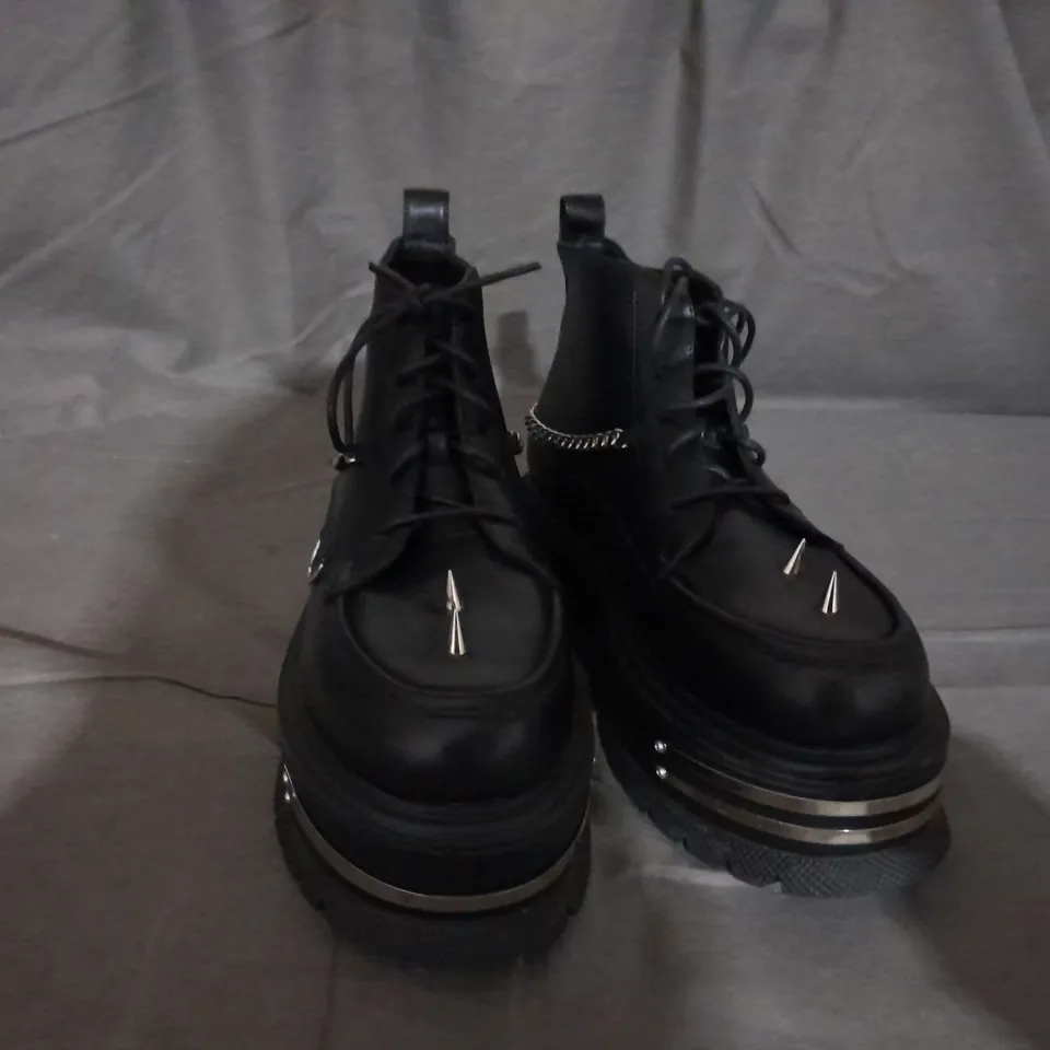 PAIR OF KOI LACE UP BOOTS IN BLACK SIZE 6