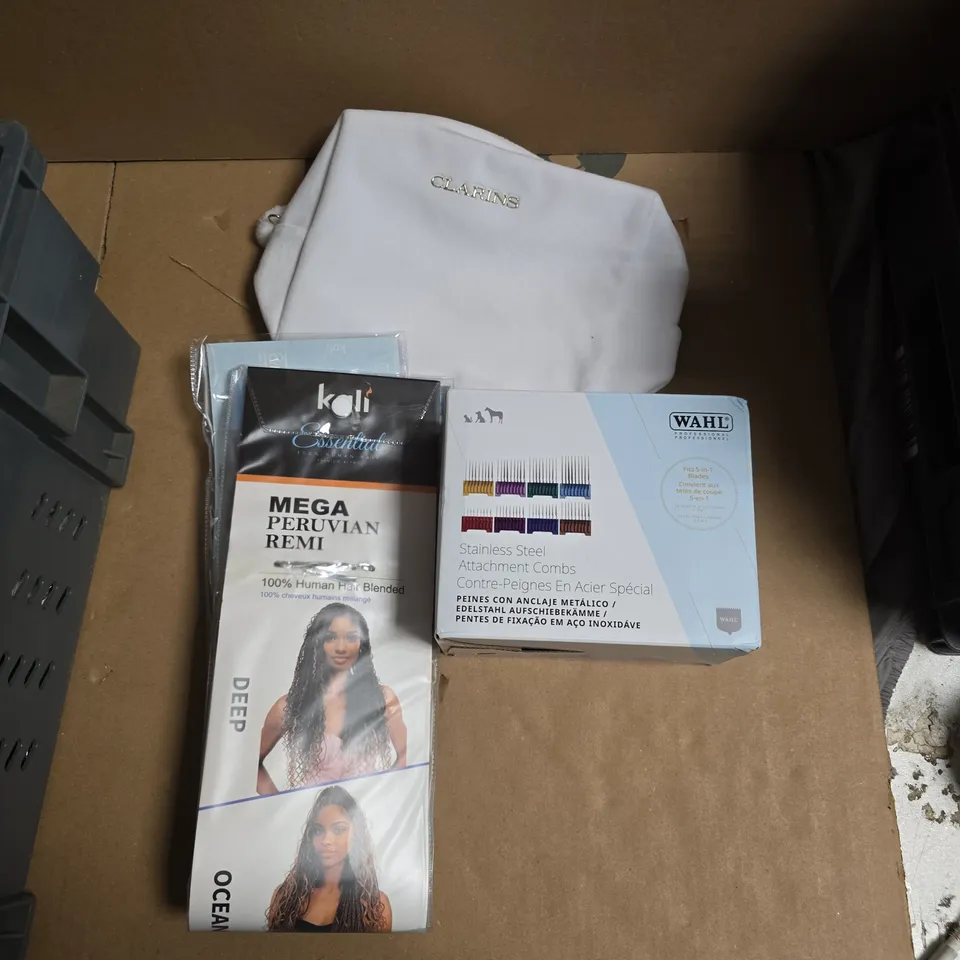APPROXIMATELY 15 ASSORTED HEALTH & BEAUTY PRODUCTS TO INCLUDE HAIR EXTENSIONS, CLARINS MAKE-UP BAG, WAHL ATTACHMENT COMBS SET ETC - COLLECTION ONLY