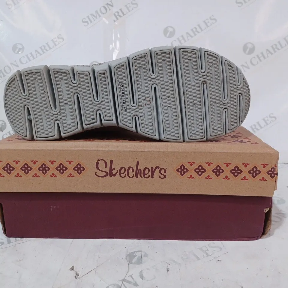 boxed pair of SKECHERS WARM BOOTS, BLUSH - SIZE 6.5