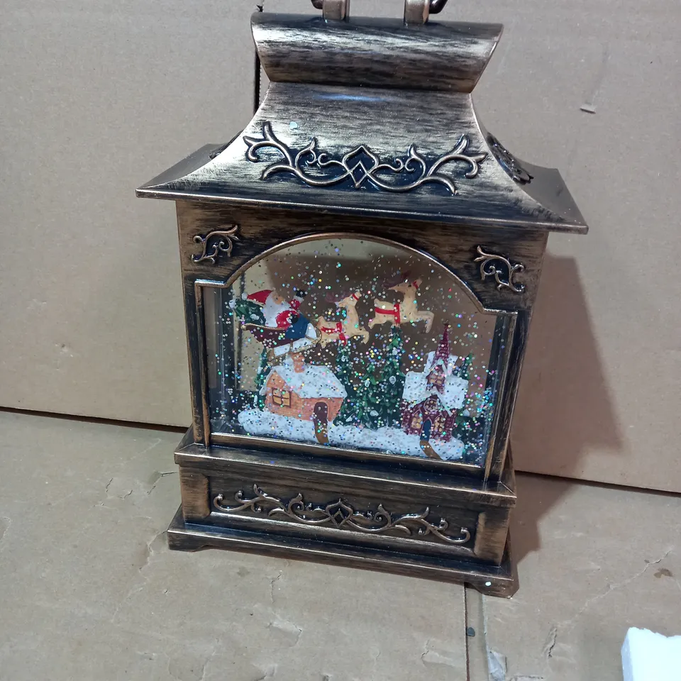 FESTIVE PRE-LIT MUSICAL WATER SPINNER WITH SWIRLING GLITTER