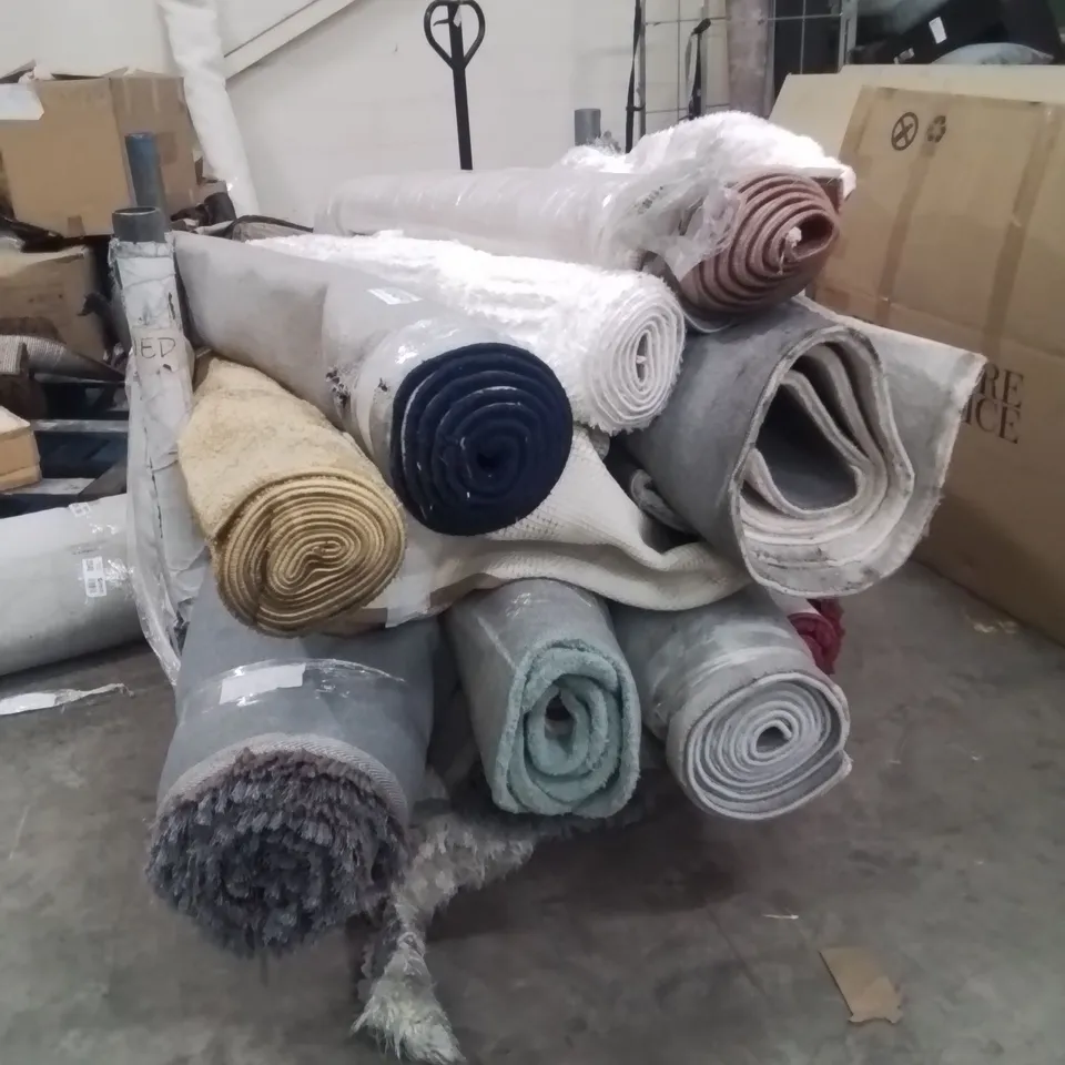 STILLAGE  OF APPROXIMATELY 15 QUALITY DESIGNER RUGS