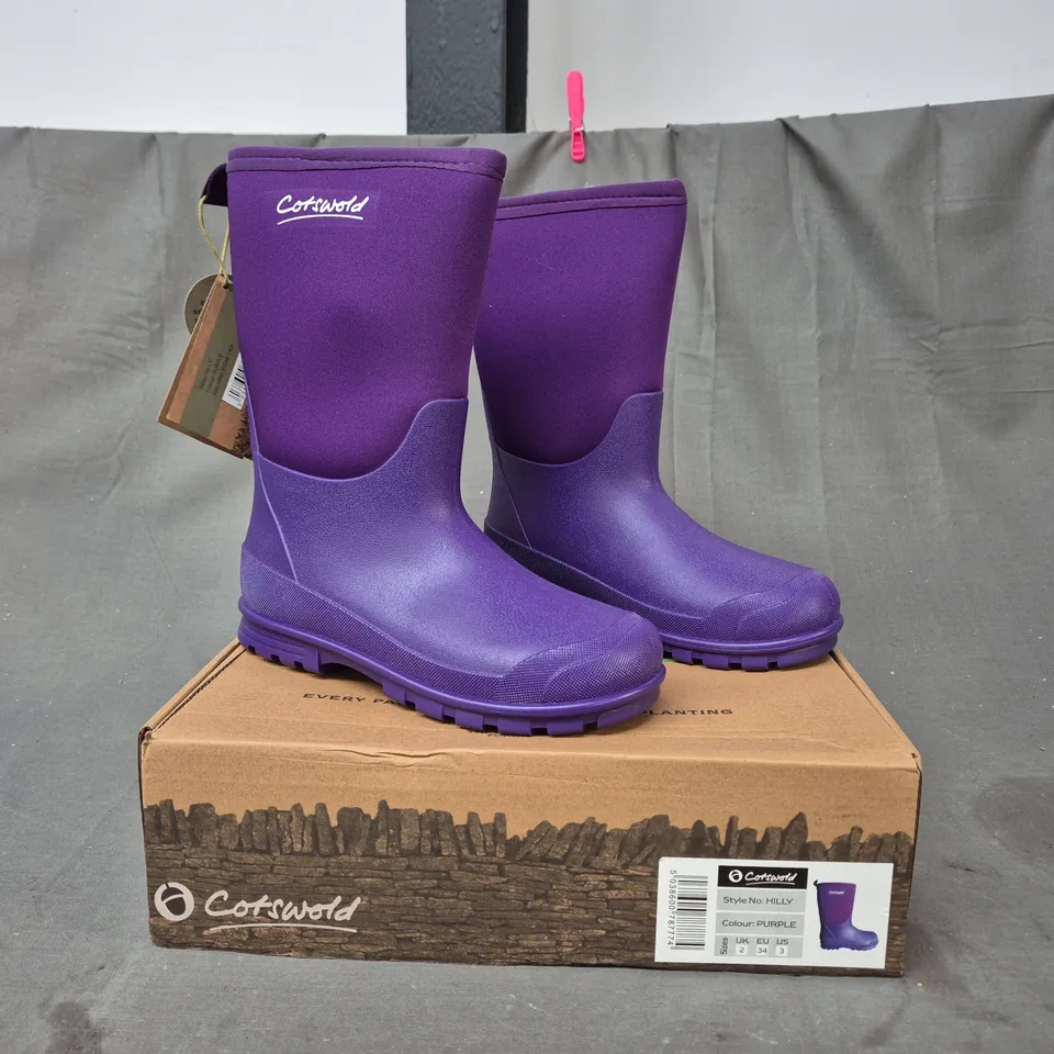 BOXED PAIR OF COTSWOLD WELLINGTON BOOTS IN PURPLE UK SIZE 2