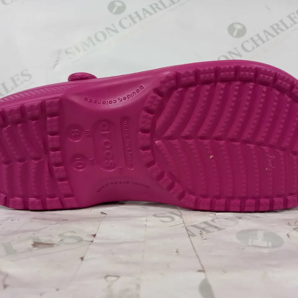 BOXED PAIR OF CROCS CLASSIC SHOES IN FUCHSIA SIZE M8/W10