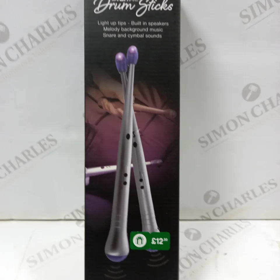2 ASSORTED PRODUCTS TO INCLUDE; WINNING DIGITAL DRUM STICKS AND SILICON FLEXIBLE ROLL UP PIANO