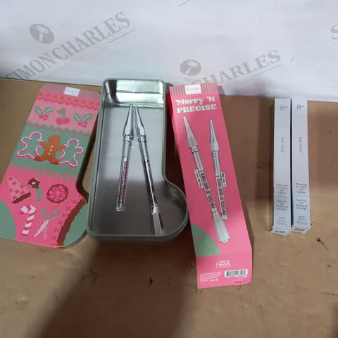 LOT OF 2 ASSORTED HEALTH AND BEAUTY ITEMS TO INCLUDE IT N0-TUG SET AND BENEFIT MERRY N PRECISE SET