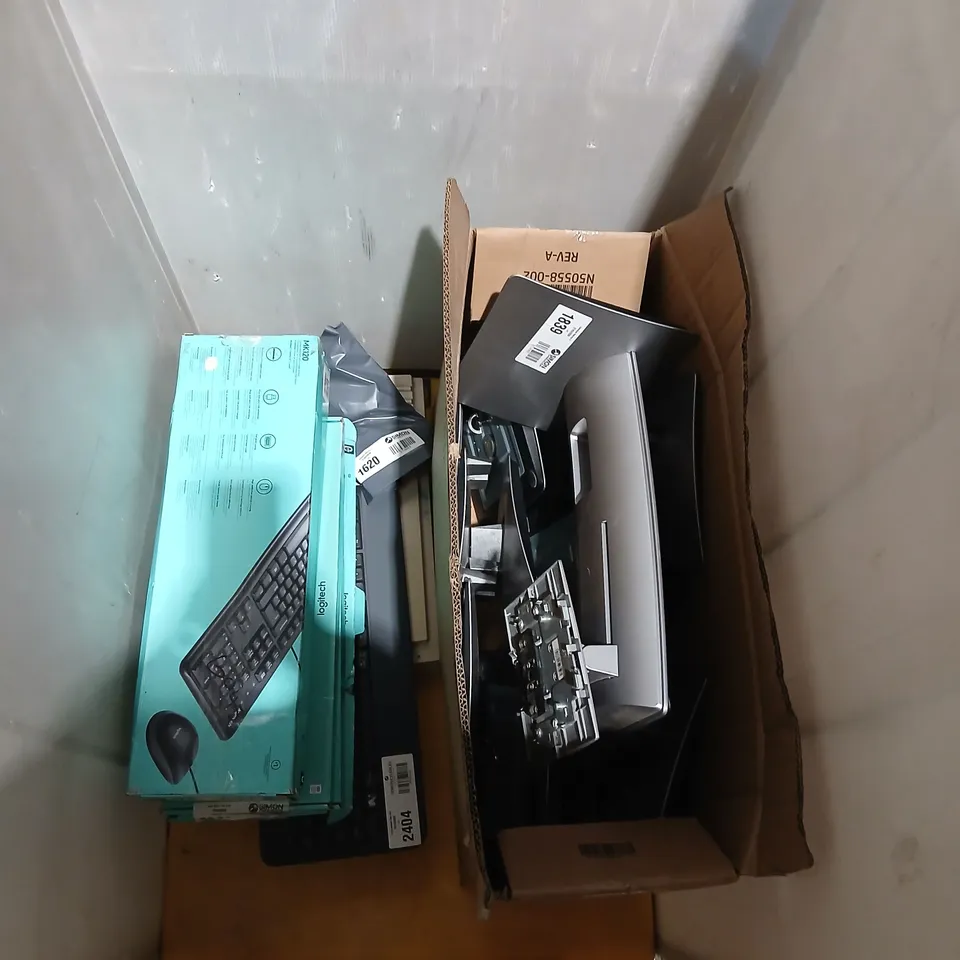 CAGE OF APPROXIMATELY 7 ASSORTED PRODUCTS TO INCLUDE; LOGITECH KEYBOARDS, SANYO BATTERY CHARGER, OPTIC PRO SCANNER AND MONITOR STAND BASES
