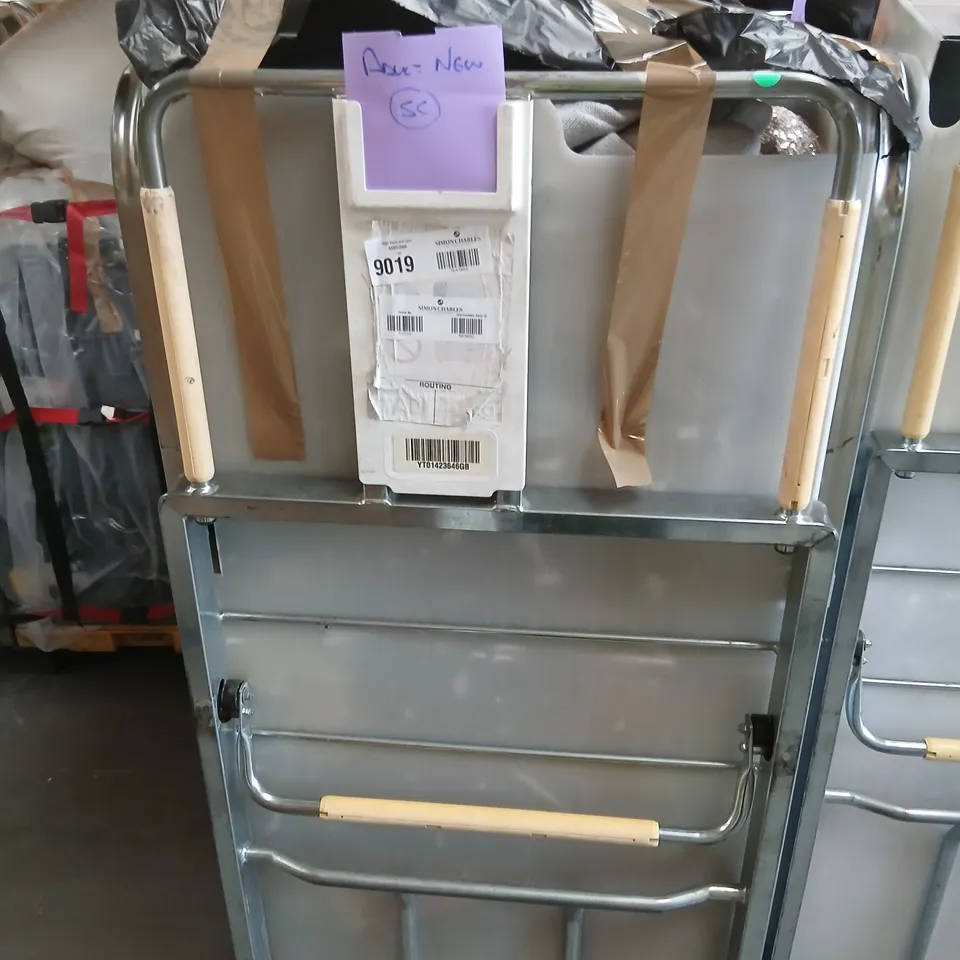 LARGE CAGE OF ASSORTED UNPROCESSED RAW RETURN DESIGNER CLOTHING