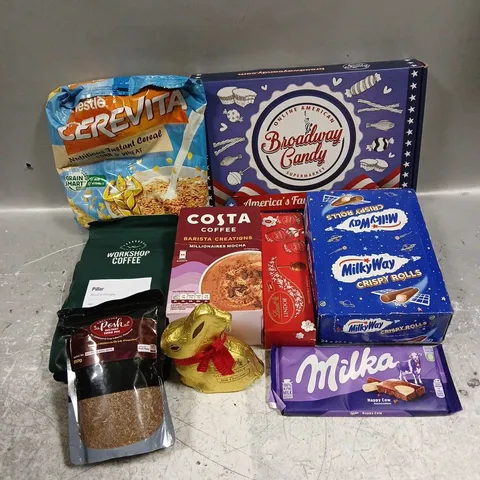 APPROXIMATELY 12 ASSORTED FOOD & DRINK ITEMS TO INCLUDE - MILKY WAY CRISPY ROLLS - BROADWAY CANDY BLISSFUL KISSES - LINDT LINDOR EGGS - ETC