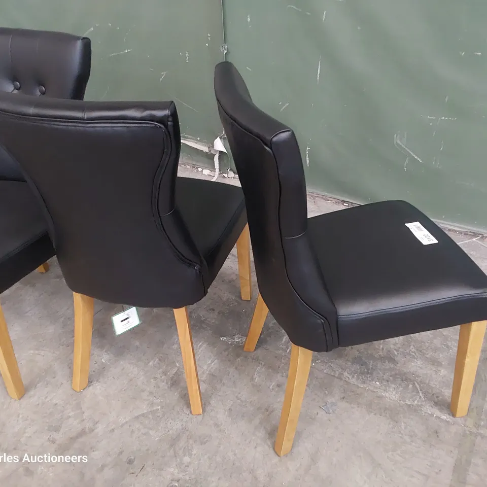 SET OF FOUR BUTTONED BACK UPHOLSTERED DINING CHAIRS BLACK PU ON NATURAL WOOD LEGS 
