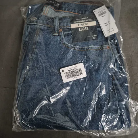 BAGGED ABERCROMBIE & FITCH VINT AGE STRETCH ATHLETIC LOOSE JEANS IN BLUE - 34W/32L
