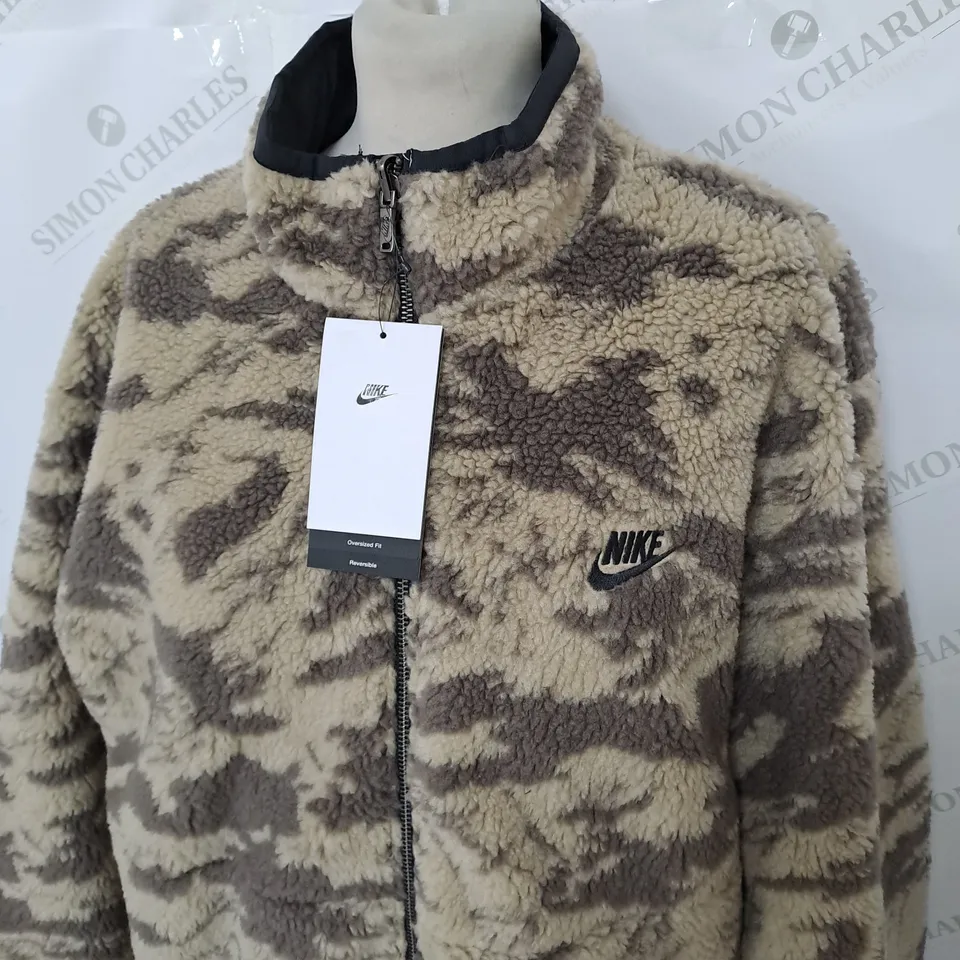 NIKE ZIPPED ANIMAL PRINT FLEECED JACKET SIZE M
