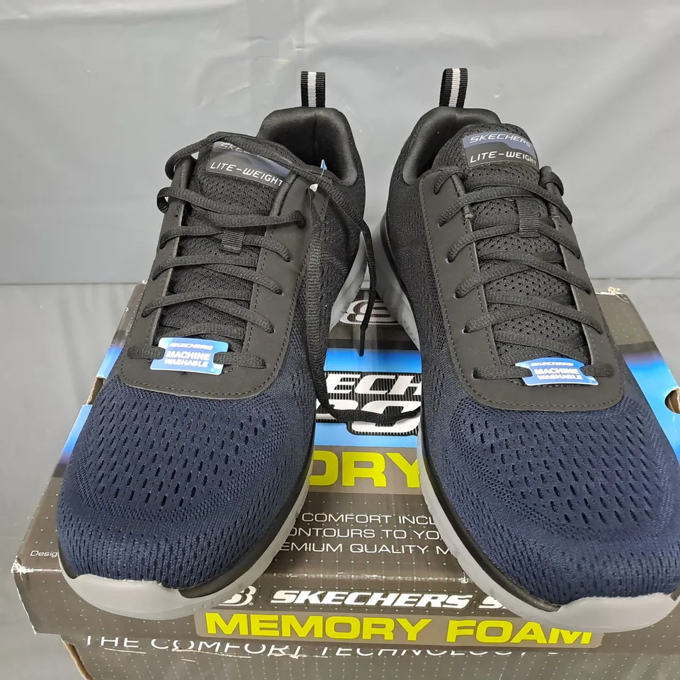 BOXED PAIR OF SKECHERS TRACK RIPKENT TRAINERS IN NAVY/BLACK - UK 13