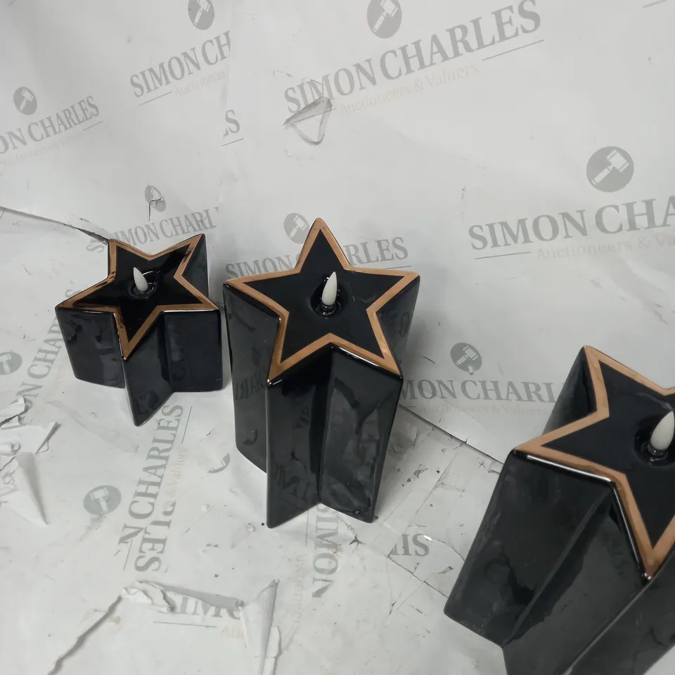 HOME REFLECTIONS CERAMIC STAR PRE-LIT CANDLES - BLACK