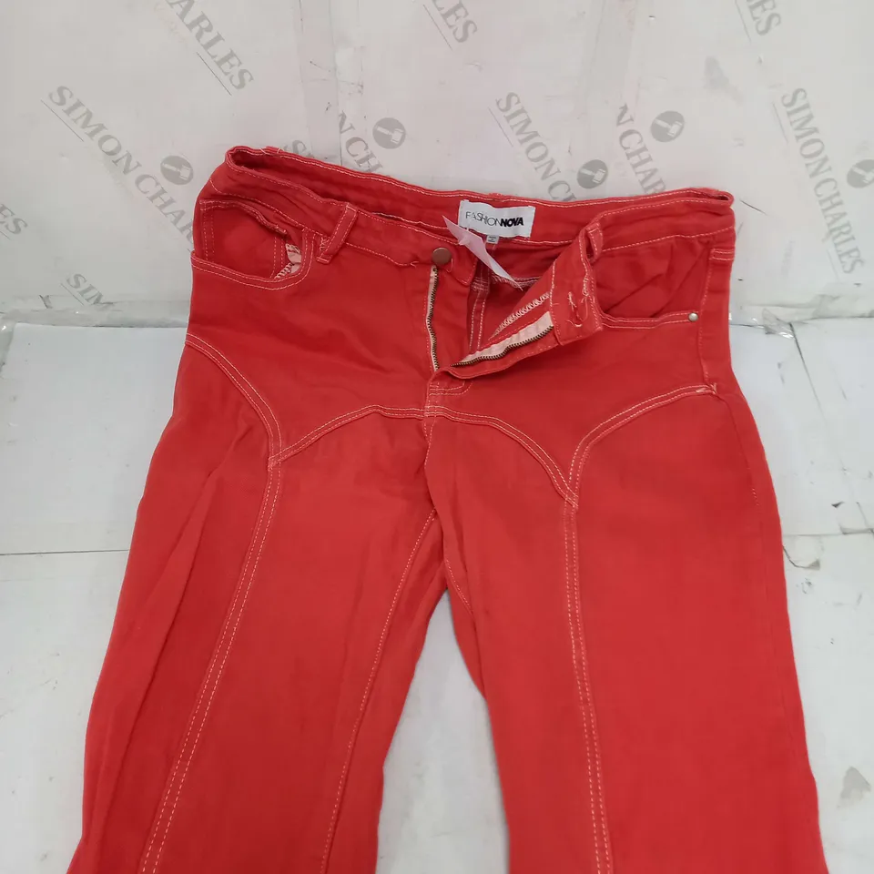 APPROXIMATELY 30 ASSORTED CLOTHING PRODUCTS IN VARIOUS STYLES & SIZES TO INCLUDE TROUSERS, DRESSES, JACKETS ETC 