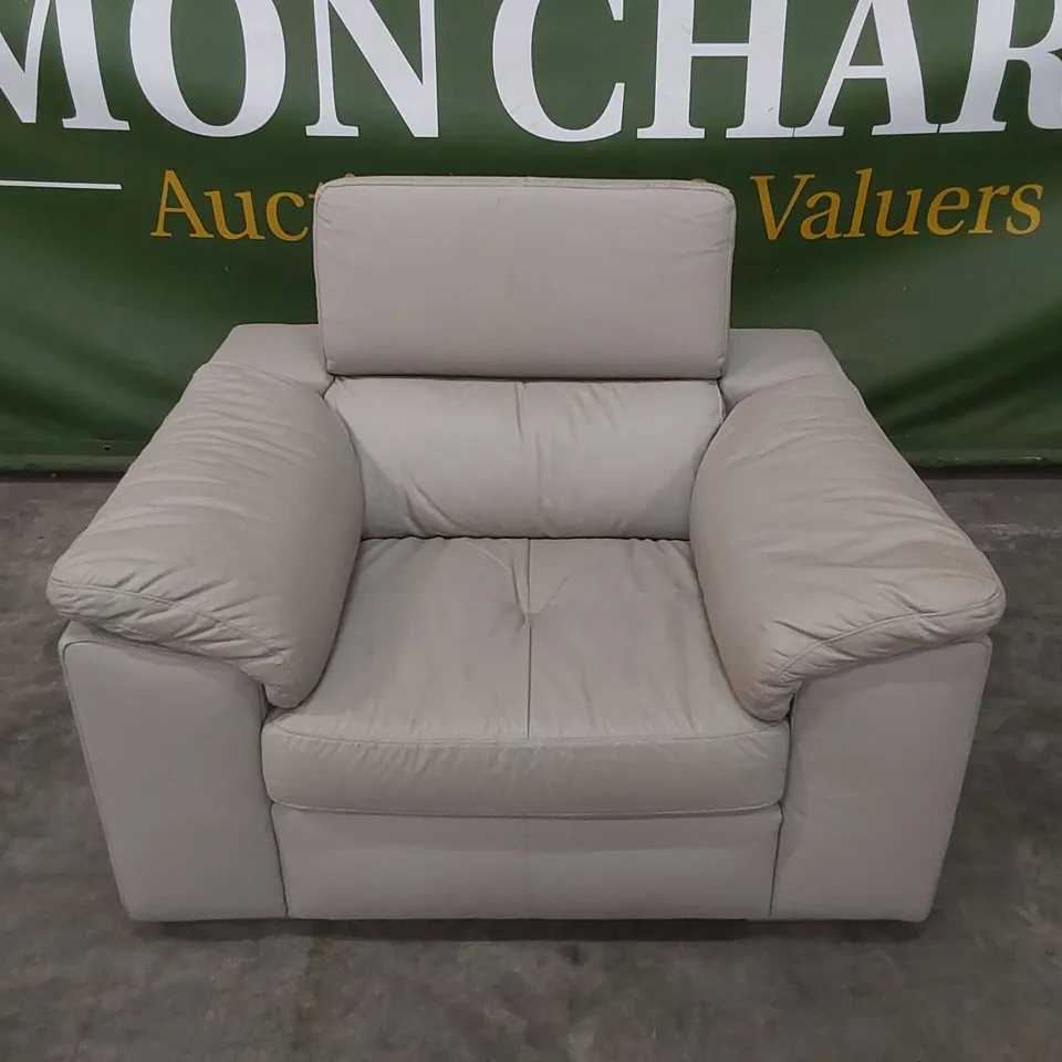 DESIGNER FAUX LEATHER UPHOLSTERED ARMCHAIR WITH ADJUSTABLE HEADREST