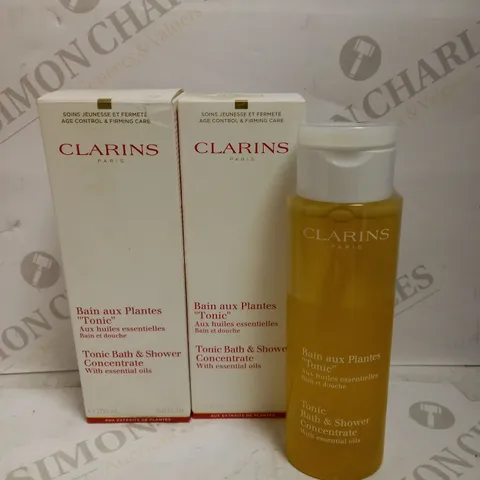 LOT OF 2 X 200ML CLARINS TONIC BATH AND SHOWER CONCENTRATE WITH ESSENTIAL OILS