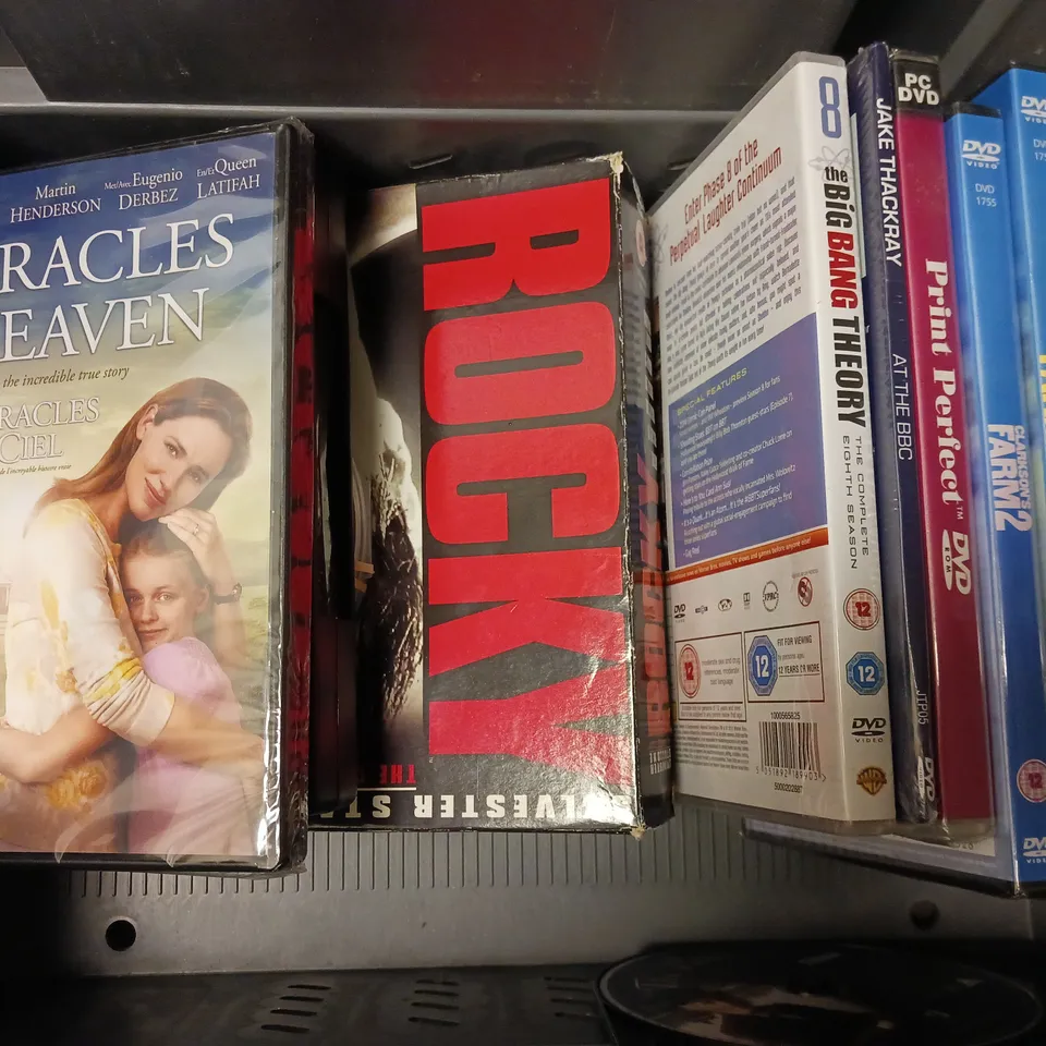 BOX OF APPROXIMATELY 20 ASSORTED DVDS TO INCLUDE - FRENCH EASY AS 1-2-3 , TED , LOONEY TUNES GOLD EDITION ETC