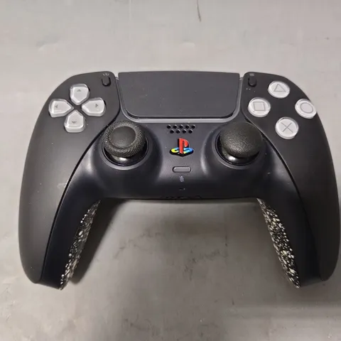 PLAYSTATION 5 GAMING CONTROLLER IN BLACK & WHITE